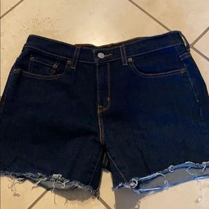 Levi’s dark wash shorts raw edge